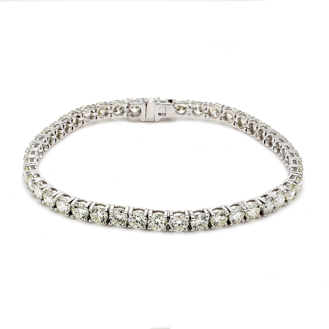 7"" Tennis bracelet with 4-prong basket set (45) round diamonds.  D8.97ct.t.w.