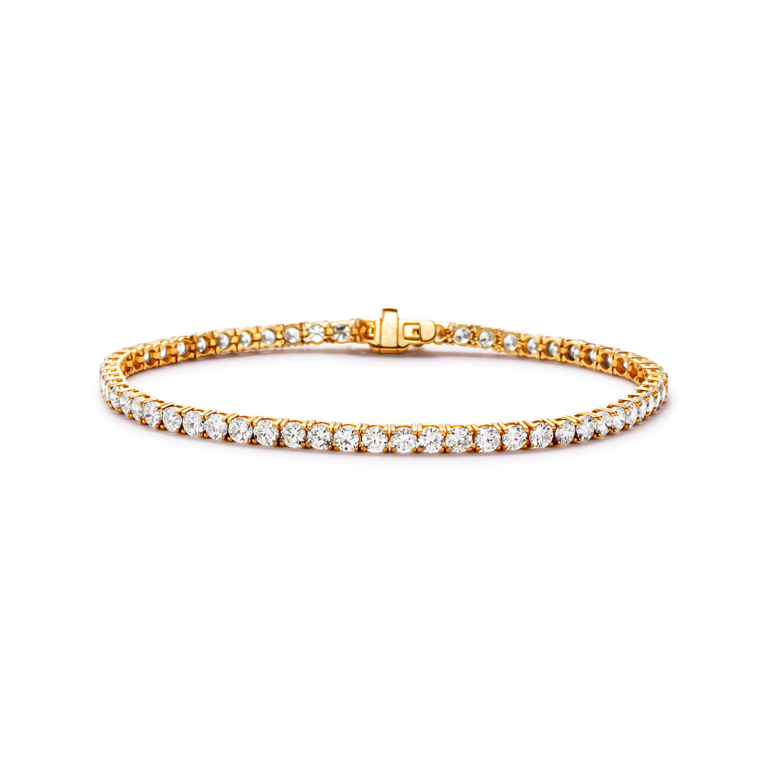 7"" Tennis bracelet in yellow gold with 4-prong set (61) round diamonds.  D5.03ct.t.w.