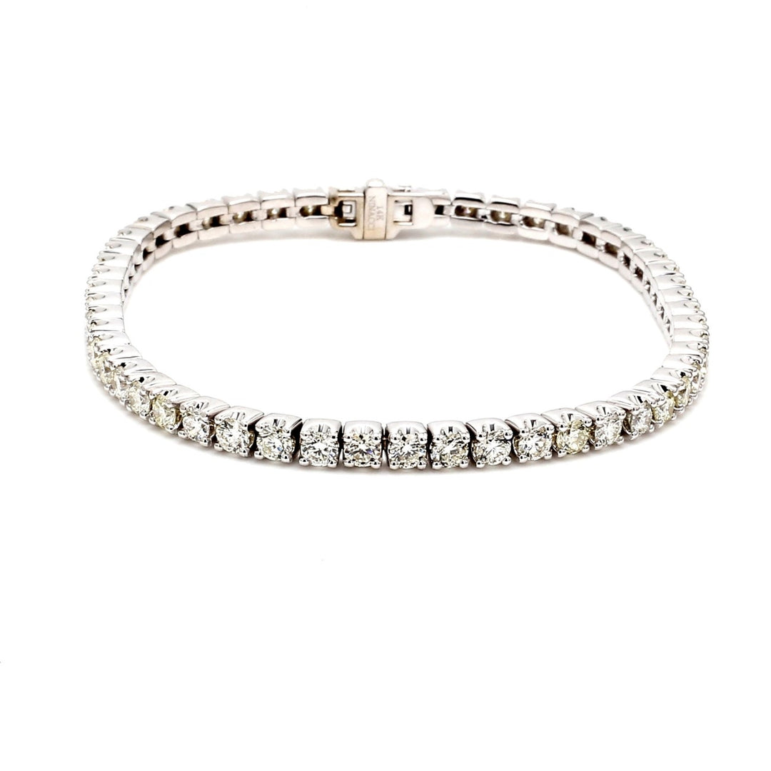 7"" Tennis bracelet with prong set (52) round diamonds.  D5.85ct.t.w.