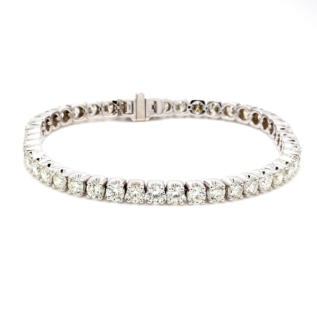 7"" Tennis bracelet with prong set (45) round diamonds.  D9.56ct.t.w.