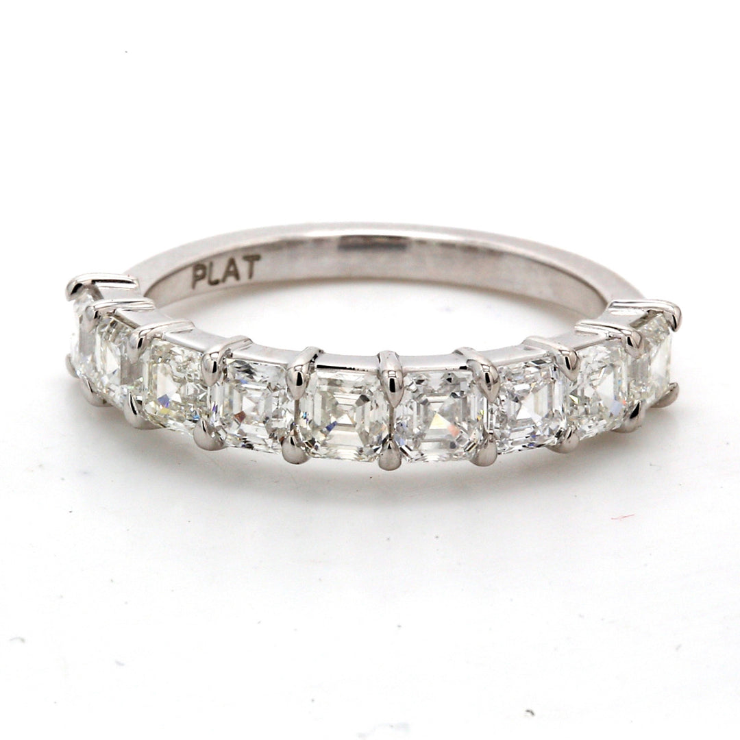 9-stone band in platinum with basket prong set asscher cut diamonds.  D1.68ct.t.w.  Size 6