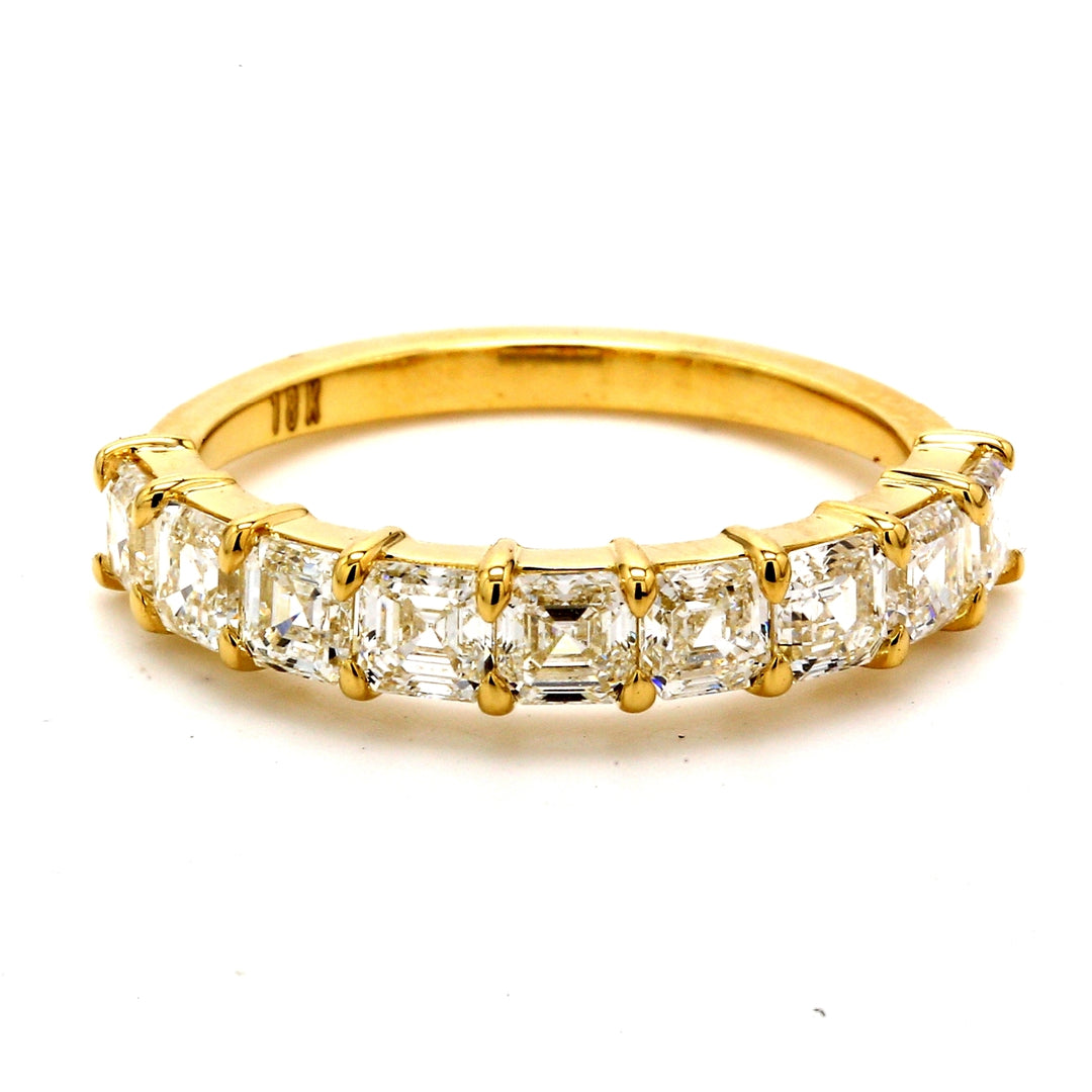 9-stone band in 18K YG with basket prong set asscher cut diamonds.  D1.88ct.t.w.  Size 7.5