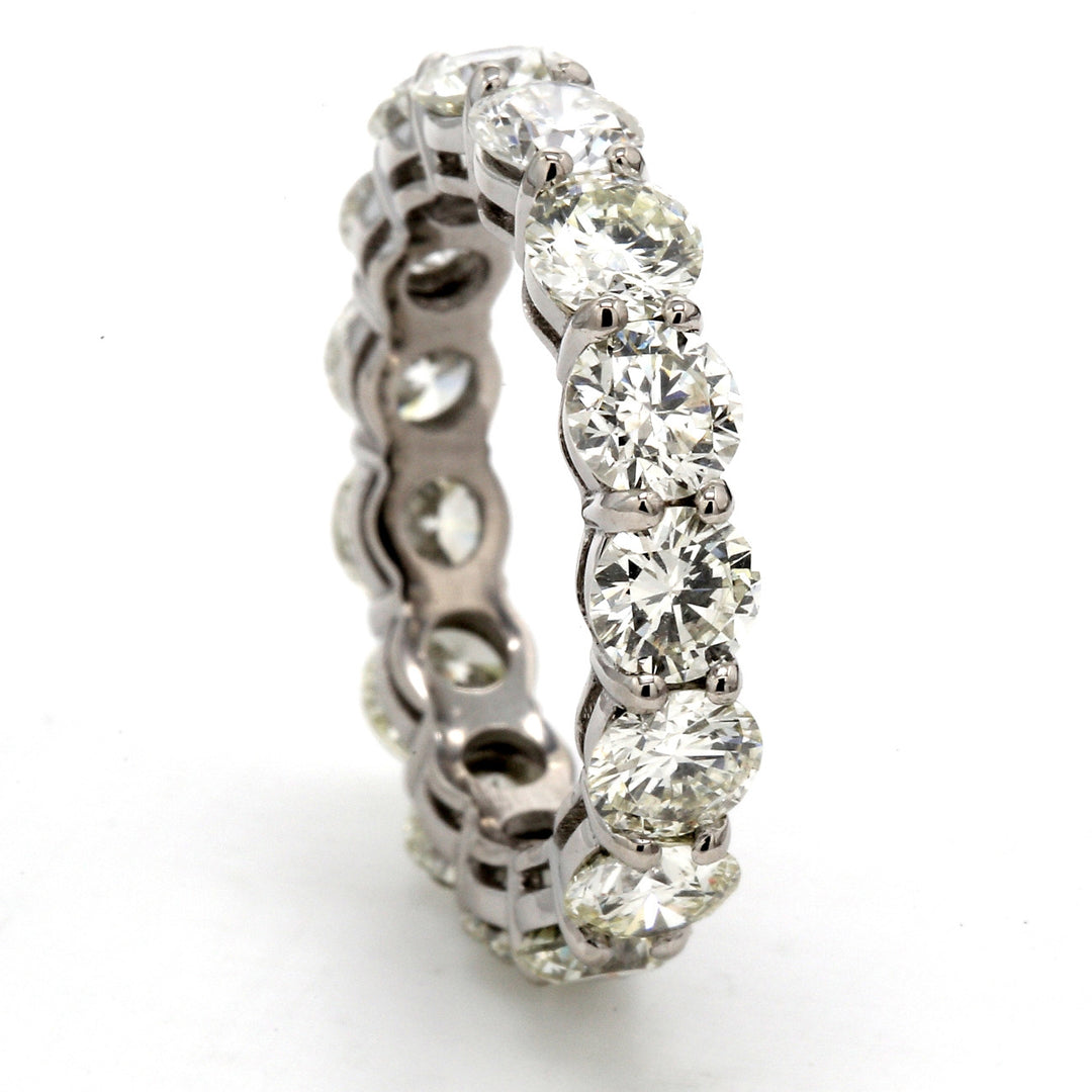 Eternity band in platinum with basket prong set (15) round diamonds.  D4.61ct.t.w.  Size 5