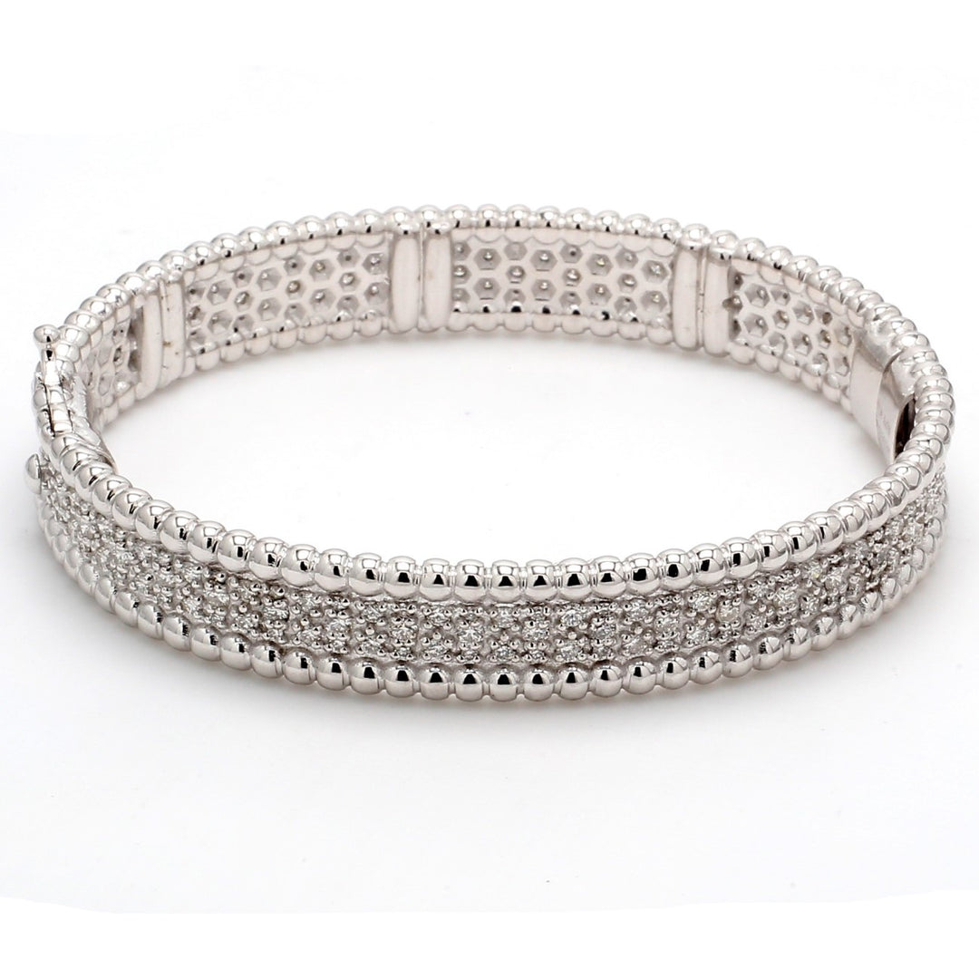Bangle in 18K WG with pave set (204) round diamonds.  D2.67ct.t.w.