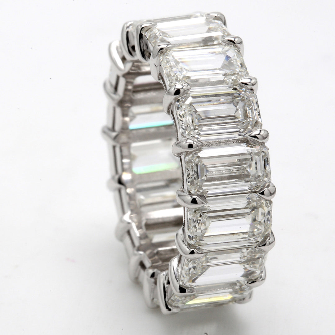 Eternity band in platinum with basket claw prong set GIA certified G-I/IF-VS2 (17) emerald cut diamonds.  D12.48ct.t.w.  Size 8.25