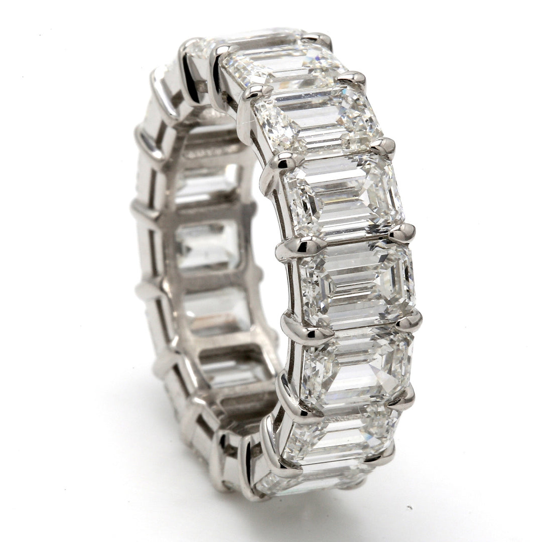 Eternity band in platinum with basket claw prong set GIA certified H-I/VVS1-VS2 (16) emerald cut diamonds.  D11.53ct.t.w.  Size 7