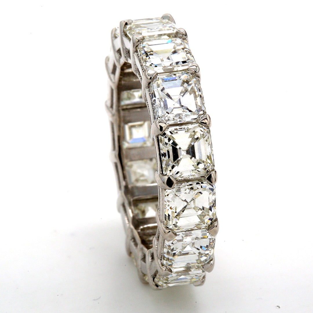 Eternity band in platinum with shared prong set (15) asscher cut diamonds.  D7.43ct.t.w.  Size 5.25