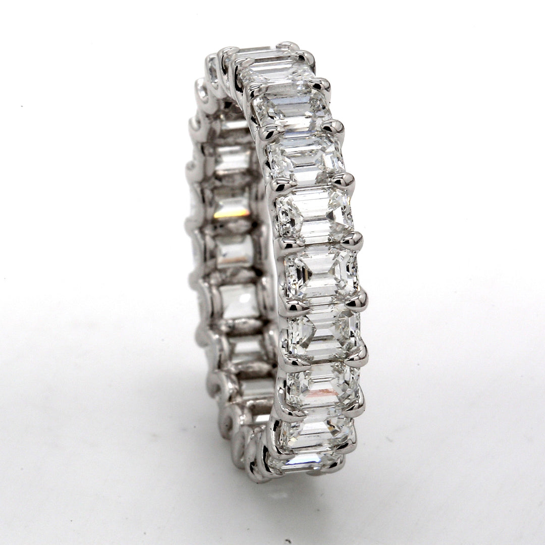 Eternity band in platinum with U-prong set (22) emerald cut diamonds.  D4.08ct.t.w.  Size 6