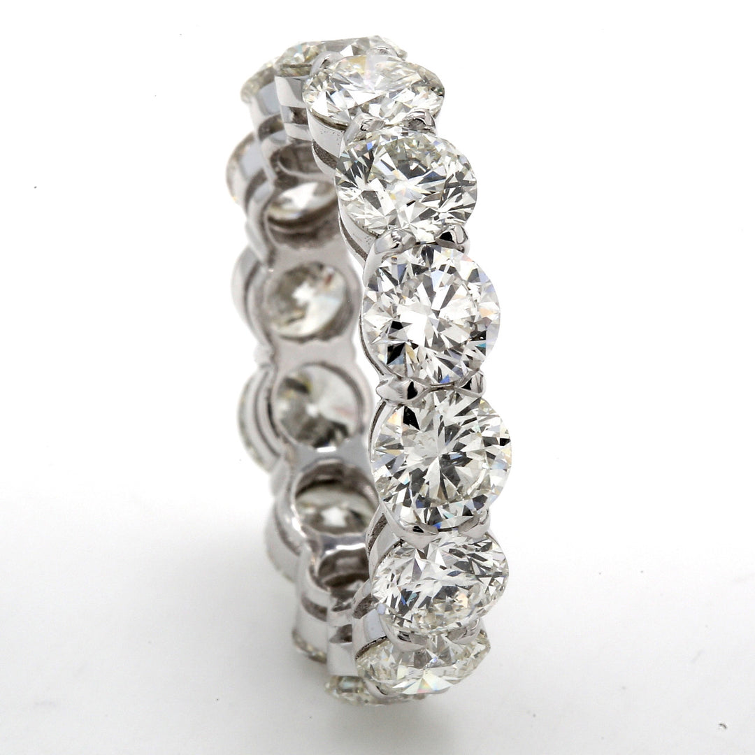 Eternity band in platinum with basket claw prong set G/SI1 (14) round diamonds.  D6.85ct.t.w.  Size 7