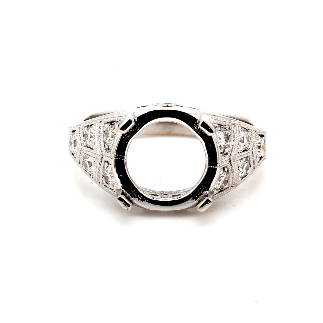 Semi-mount in 18K WG for round center stone with round diamond side stones.  D0.40ct.t.w.  Size 6.75