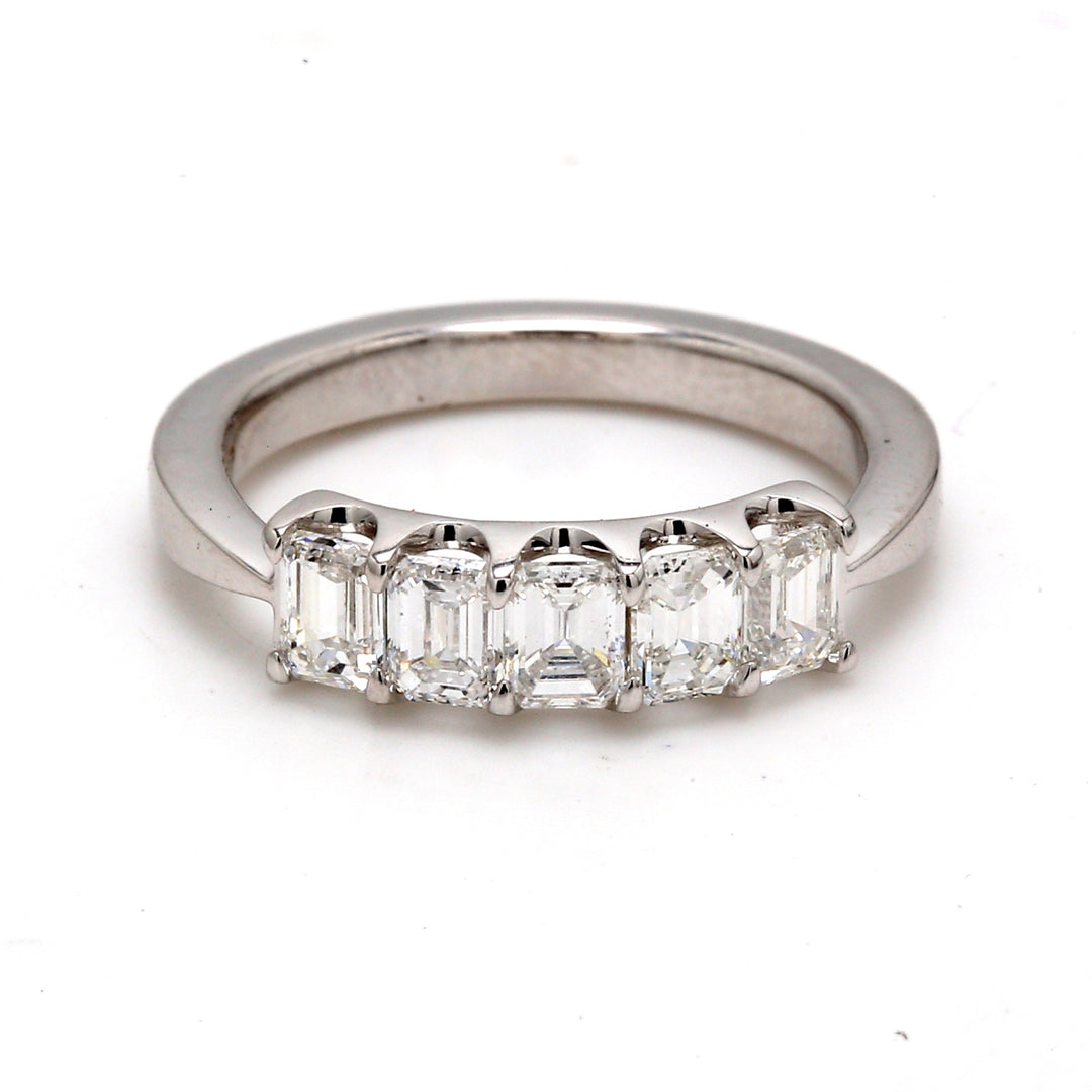 5-stone band in platinum with U-prong set emerald cut diamonds.  D0.93ct.t.w.  Size 4.5