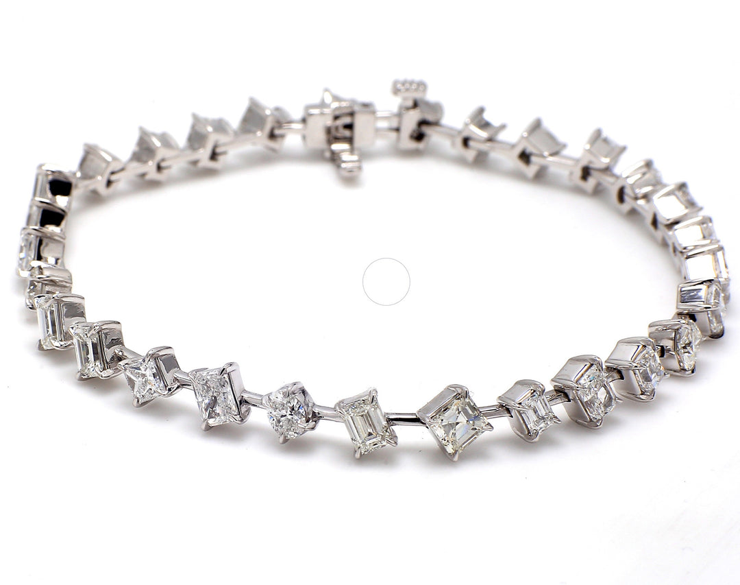 7"" Bracelet in platinum with claw prong set mixed fancy shaped diamonds.  D6.56ct.t.w.