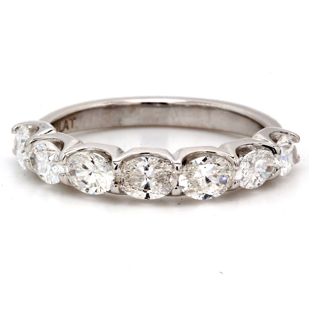 7-stone band in platinum with U-prong set oval cut diamonds.  D1.46ct.t.w.  Size 7