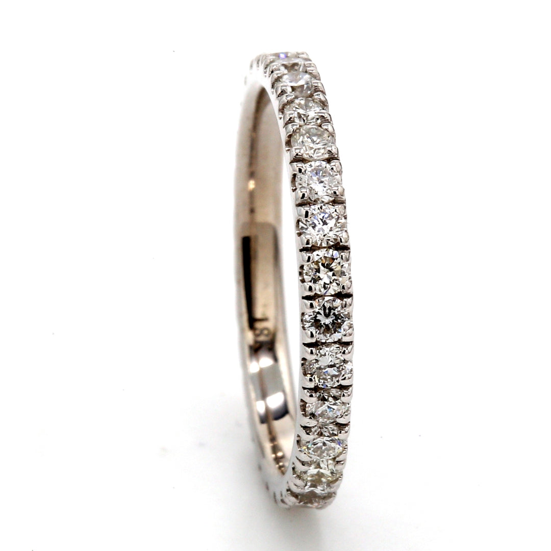 Eternity band in 18K WG with U-prong set (30) round diamonds.  D0.80ct.t.w.  Size 5