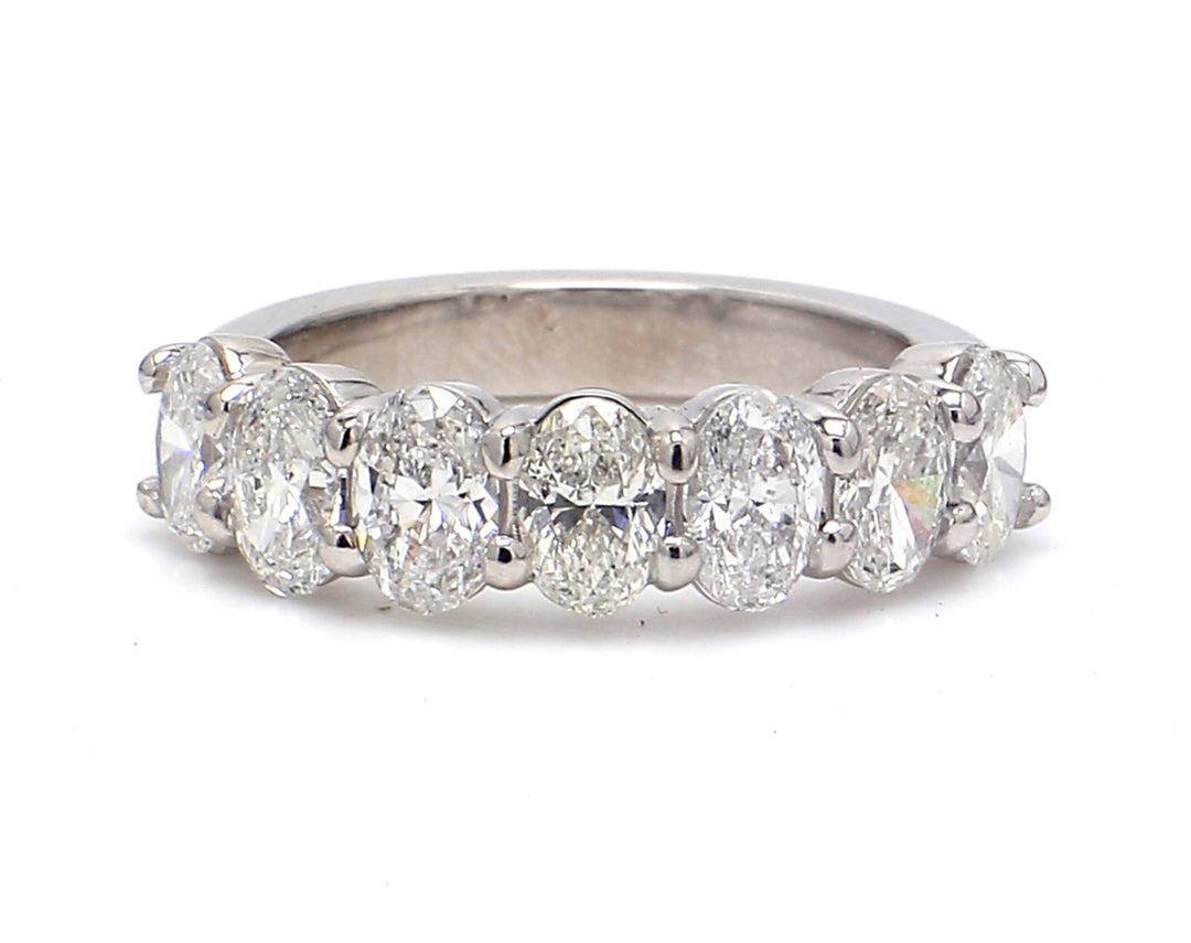 7-stone band in platinum with basket prong set oval cut diamonds.  D1.85ct.t.w.  Size 5.5