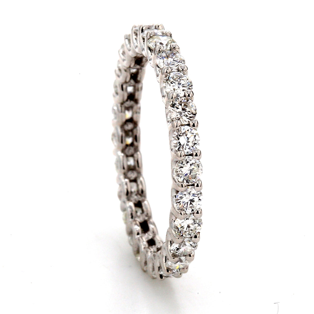 Eternity band with U-prong set (26) round diamonds.  D1.00ct.t.w.  Size 4