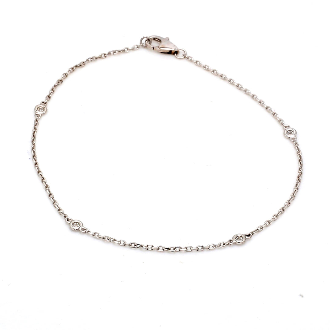 7.5"" Diamonds by the yard bracelet with bezel set (4) round diamonds.  D0.10ct.t.w.