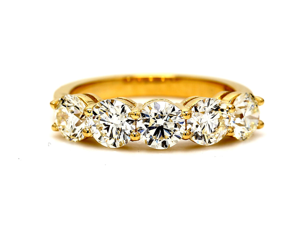 5-stone band in 18K YG with basket prong set round diamonds.  D2.01ct.t.w.  Size 6