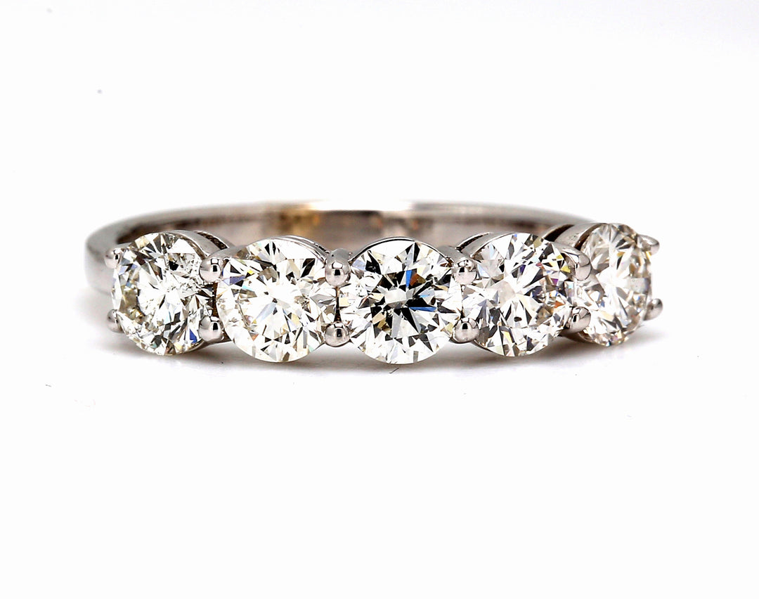 5 -stone band in 18K WG with basket prong set round diamonds.  D1.50ct.t.w.  Size 5.5-6.5