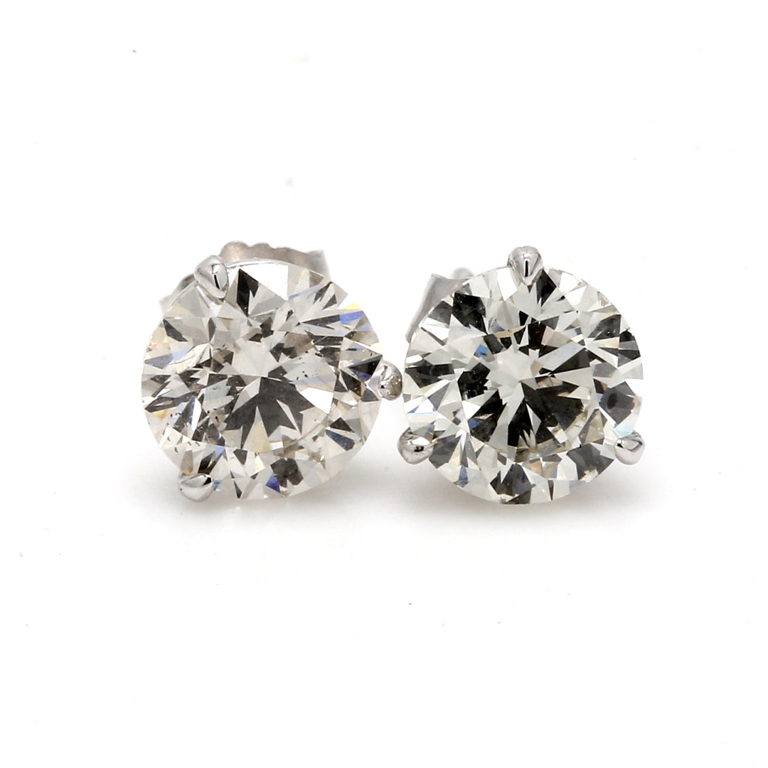 Push back stud earrings in white goldwith 3-prong set martini style USA certified J-K/VS2-SI1 round diamonds.  D3.03ct.t.w.