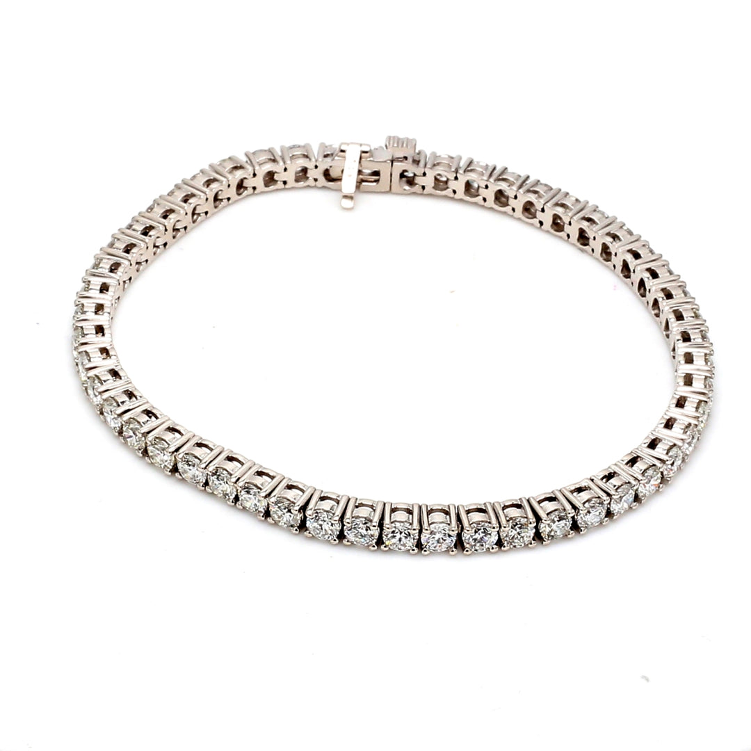 7"" Tennis bracelet with 4-prong set (51) round diamonds.  D7.47ct.t.w.