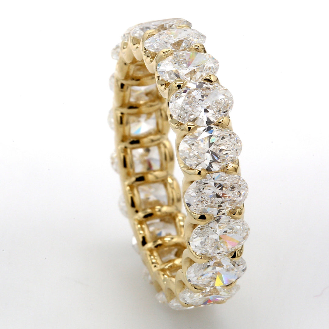 Eternity band with U-prong set (22) oval diamonds.  D2.95ct.t.w.  Size 6