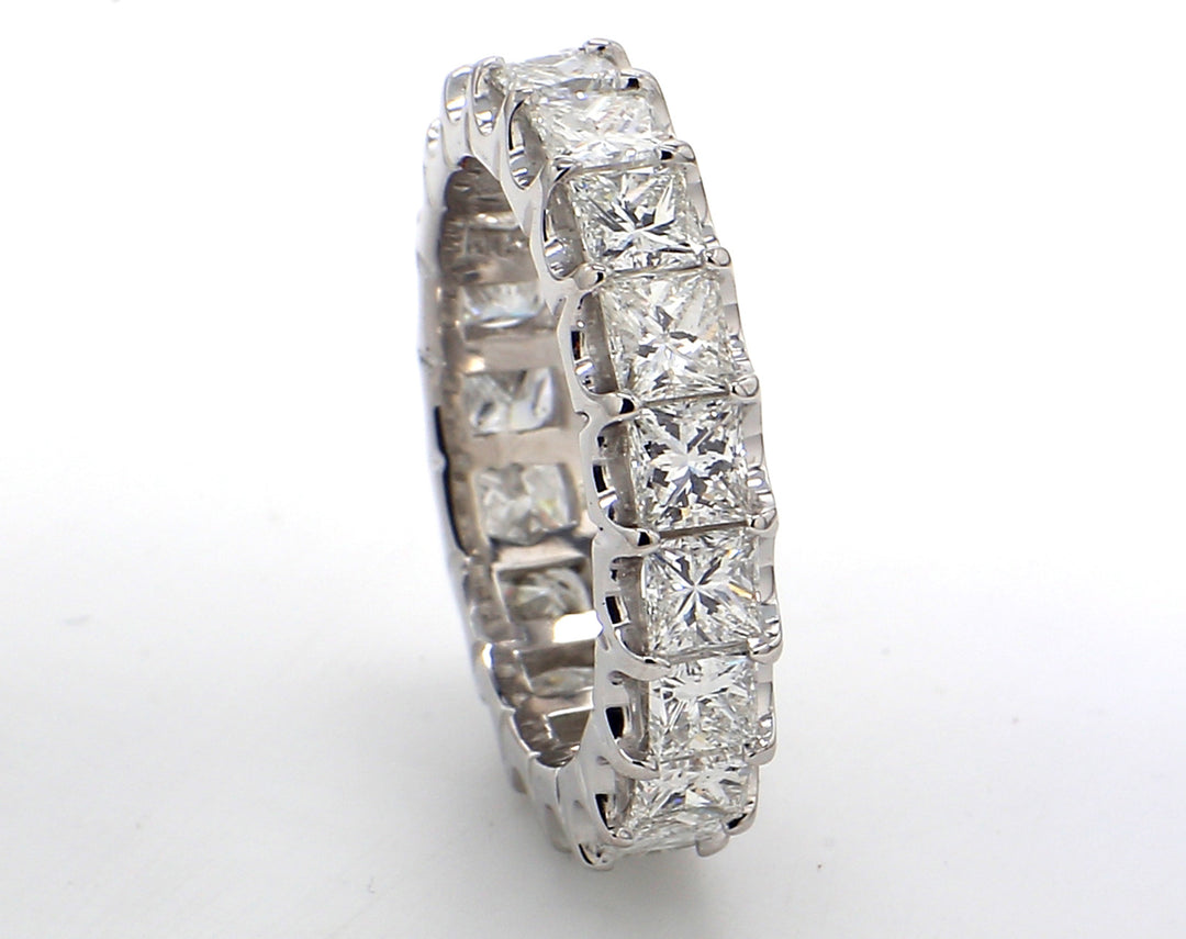 Eternity band in platinum with U-prong set (19) princess cut diamonds.  D4.01ct.t.w.  Size 6