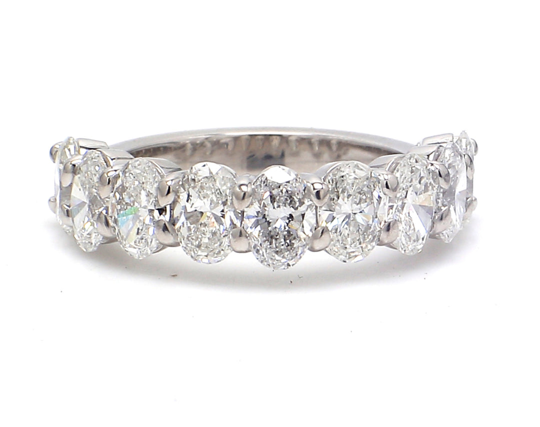 9-stone band in platinum with basket prong set oval cut diamonds.  D2.43ct.t.w.  Size 5.5