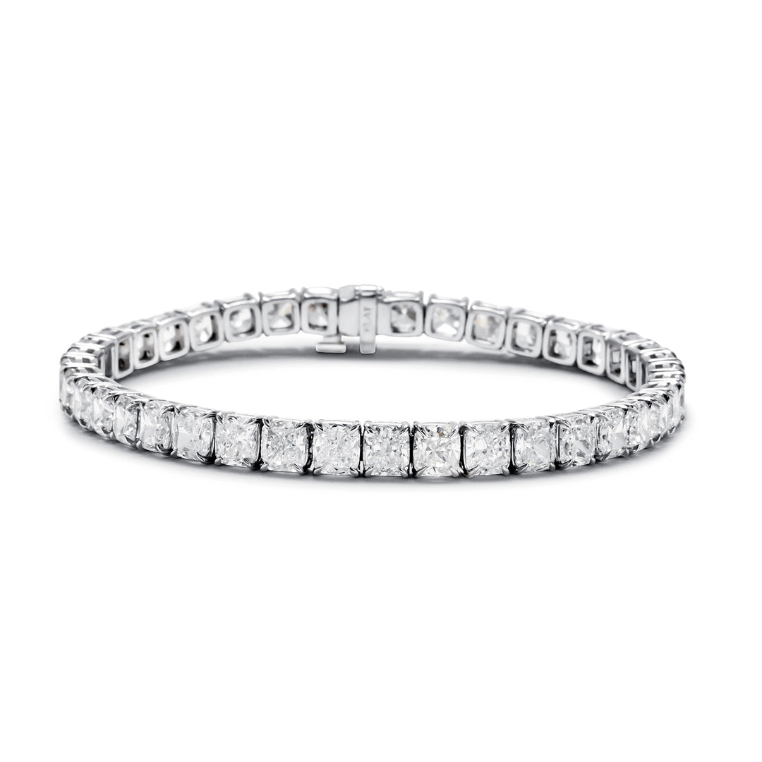 7"" Tennis bracelet in platinum with claw prong set (40) cushion cut diamonds.  D20.76ct.t.w.