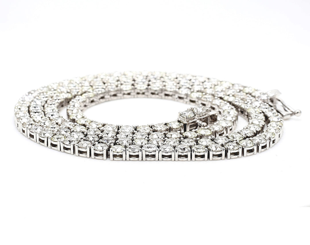 22"" Tennis necklace with 4-prong set (150) round diamonds.  D27.14ct.t.w.