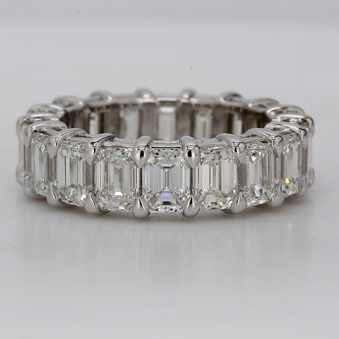 Eternity band in platinum with shared prong basket set GIA certified D-F/VVS1-VS2 (18) emerald cut diamonds.  D8.46ct.t.w.  Size 6.75