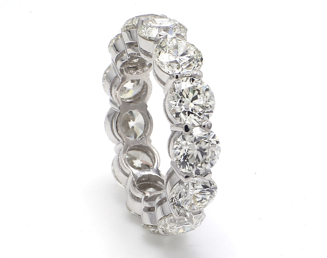 Eternity band in platinum with basket claw prong set G-I/VS2-SI1 (13) round diamonds.  D10.42ct.t.w.  Size 7