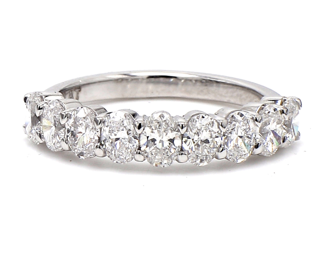 9-stone band in platinum with prong set oval cut diamonds.  D1.69ct.t.w.  Size 7