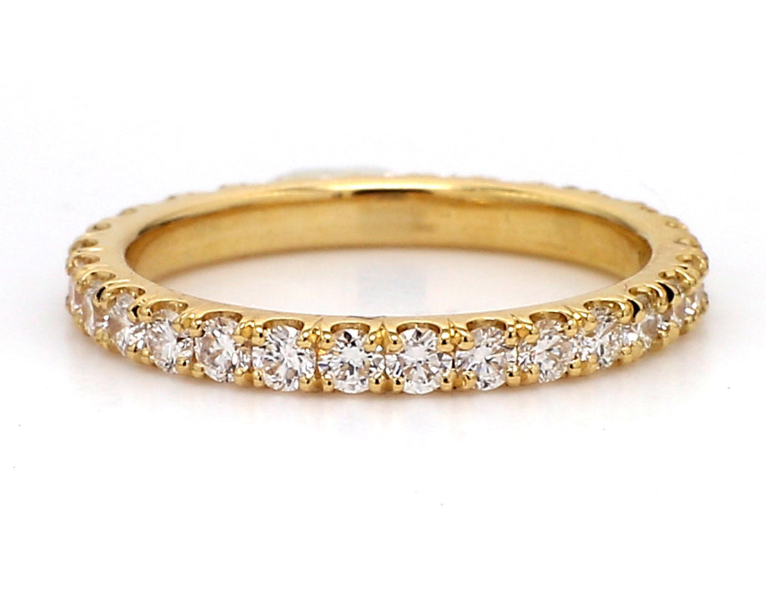 Eternity band in 18K YG with U-prong set (29) round diamonds.  D0.84ct.t.w.  Size 5