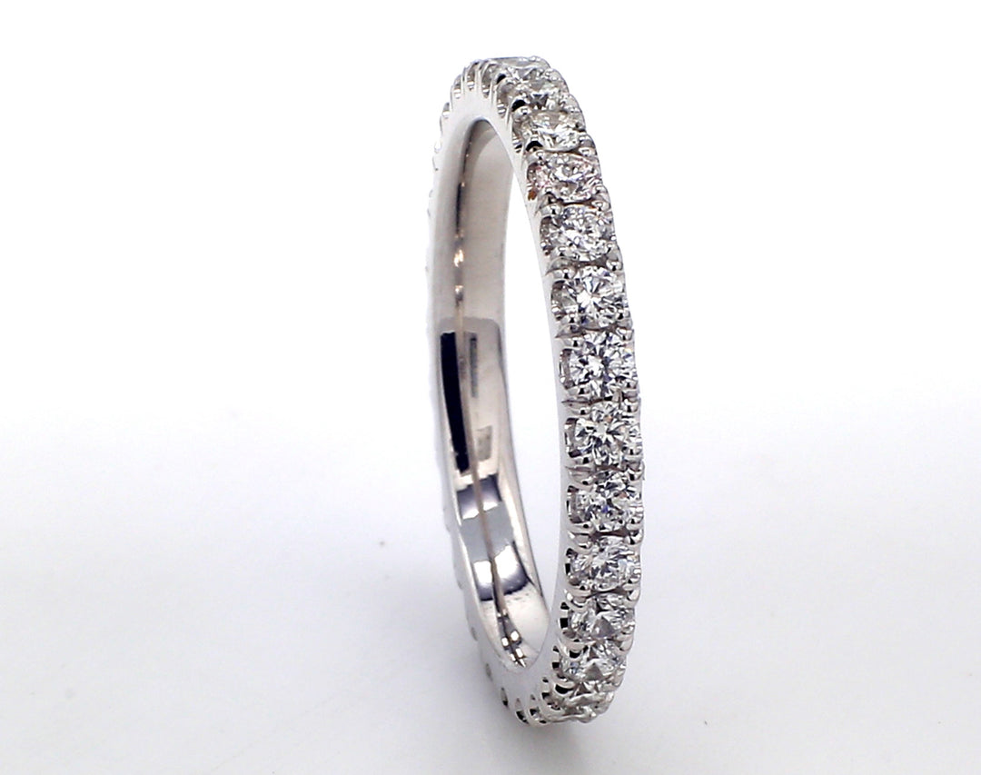 Eternity band in 18K WG with U-prong set (30) round diamonds.  D0.84ct.t.w.  Size 6