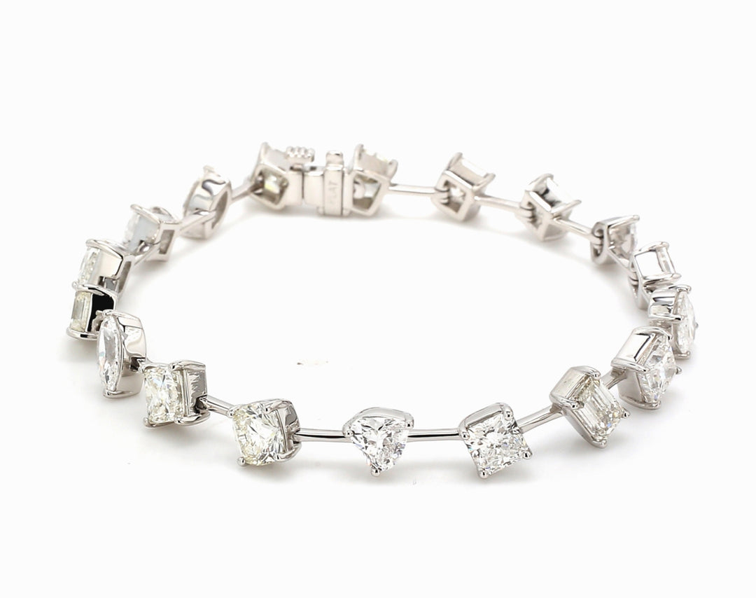 7"" Bracelet in platinum with prong set multi fancy shape diamonds.  D12.04ct.t.w.
