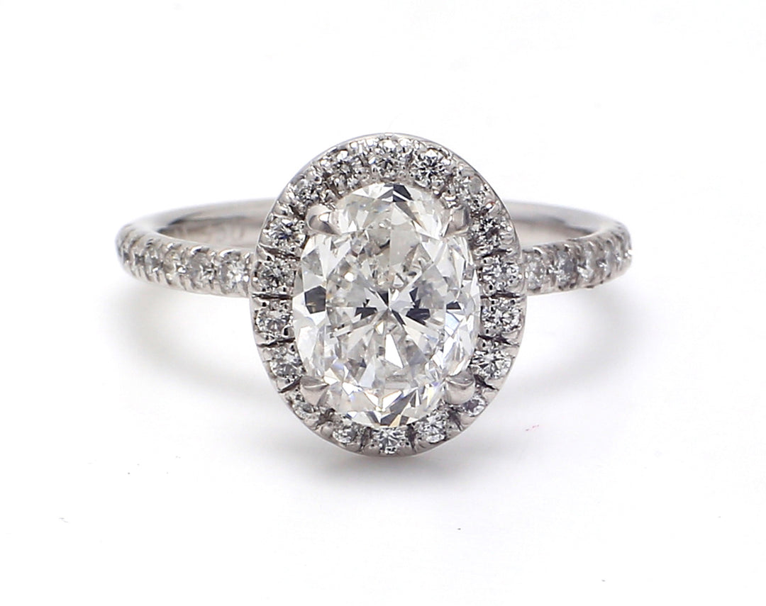 Halo semi-mount in platinum with prong set round diamonds.  D0.42ct.t.w.   Size 7