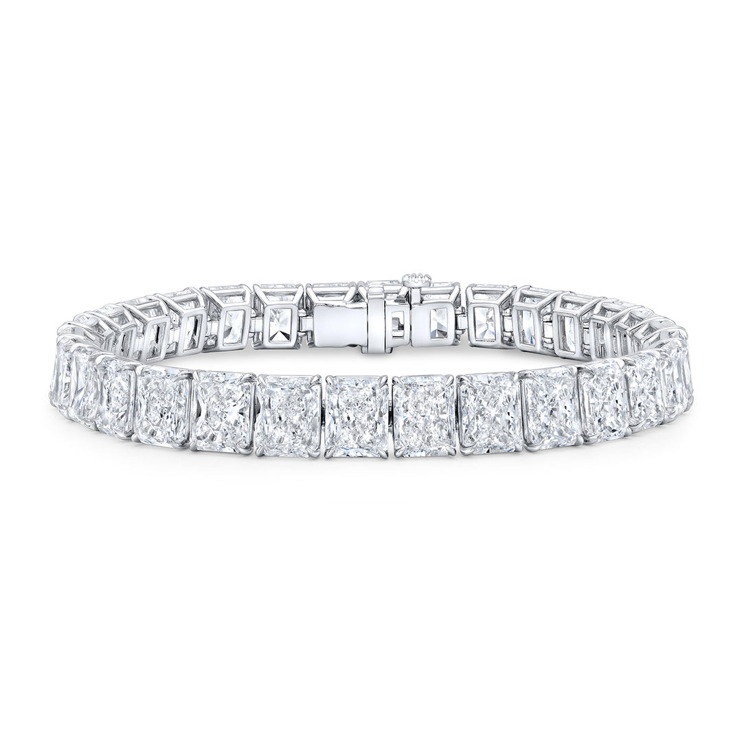7"" Tennis bracelet in platinum with basket claw prong set GIA certified D-F/SI1-SI2 (34) radiant cut diamonds.  D34.53ct.t.w.