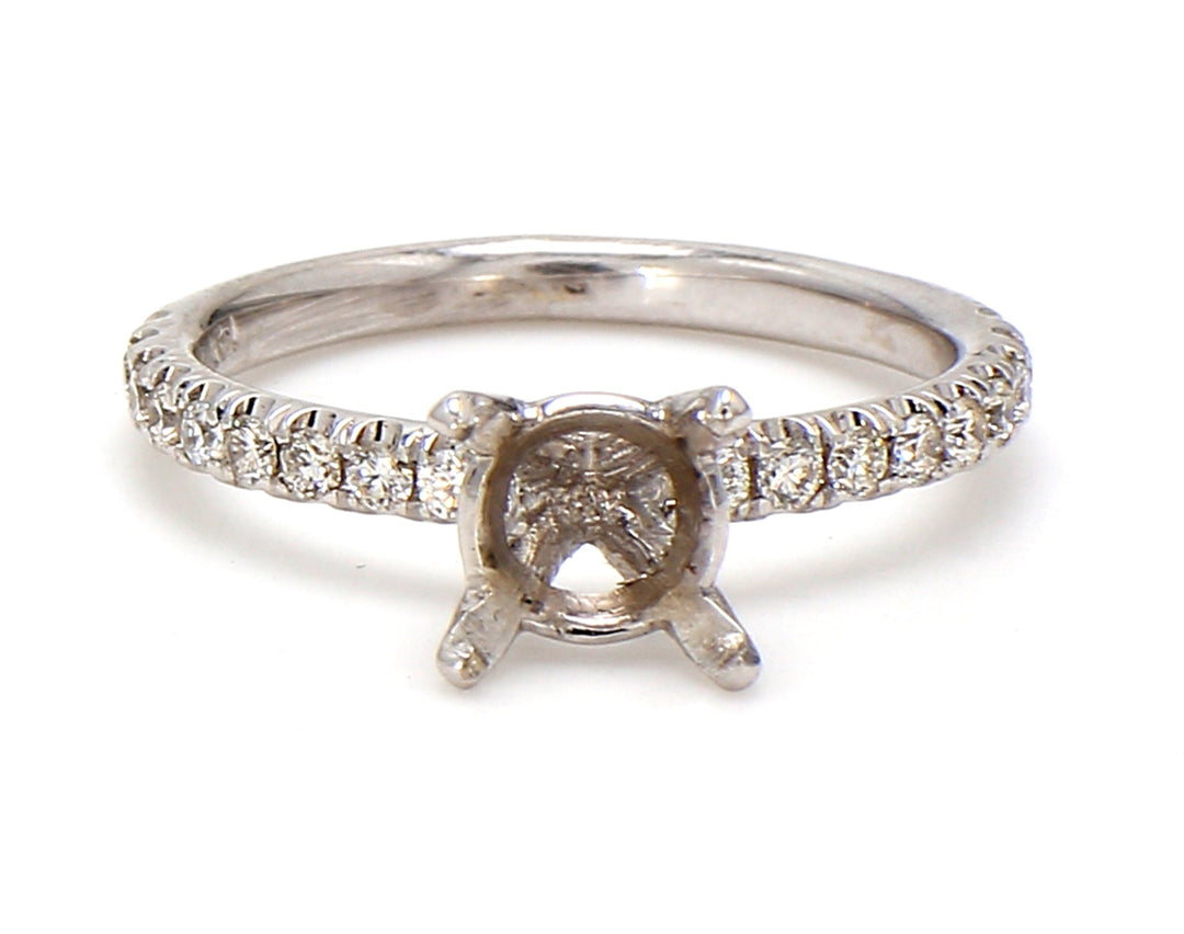 Semi-mount with pre-set round diamonds on the shank.  D0.26ct.t.w.