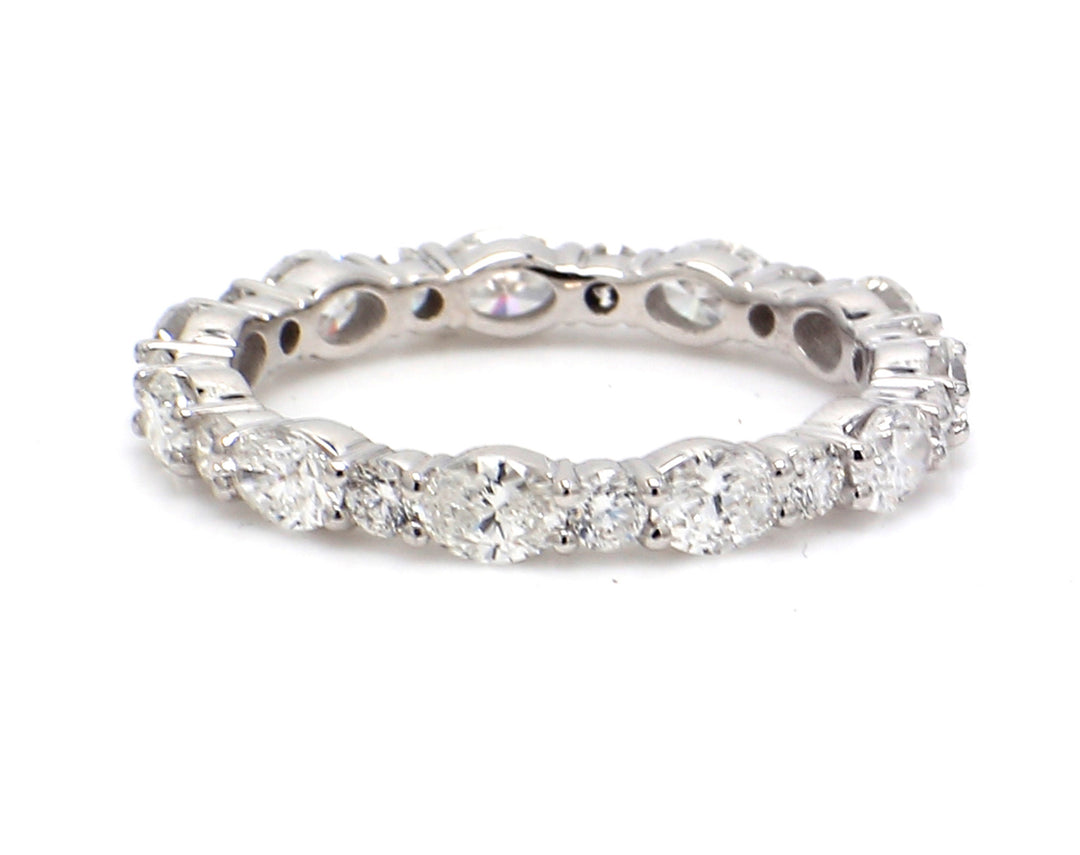 Eternity band in 18K WG with alternating pront set (11) oval cut and 11 round diamonds.  D1.99ct.t.w.  Size 7