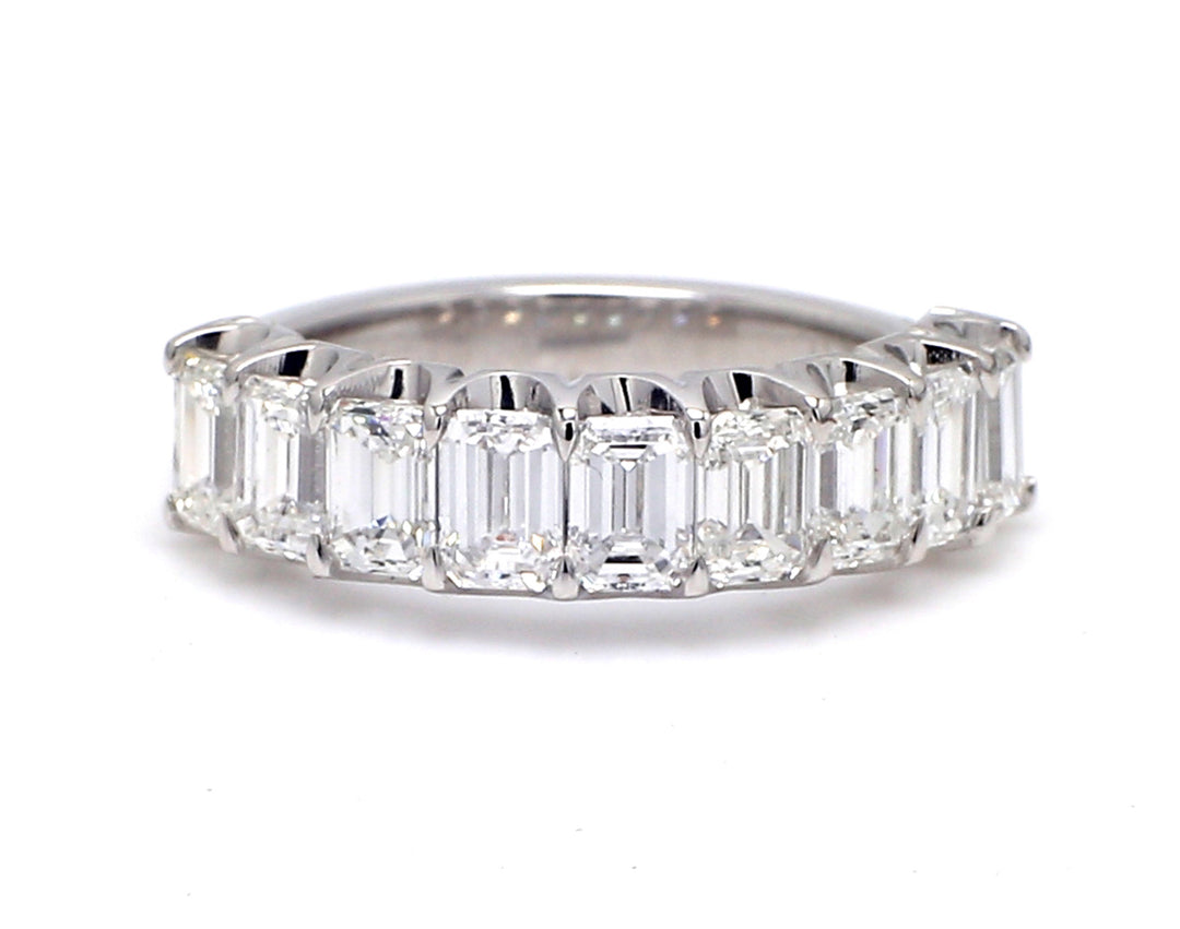 9-stone band in platinum with basket U-prong set emerald cut diamonds.  D1.94ct.t.w.  Size 5