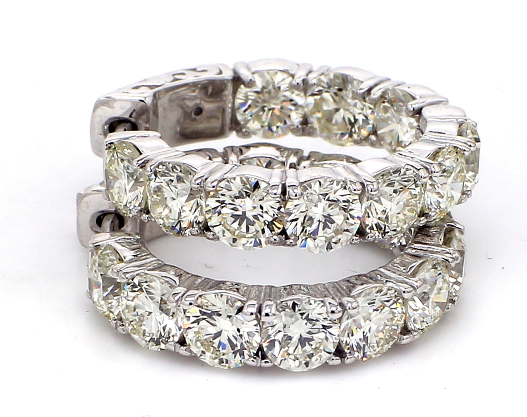 0.75"" Inside out hoop earrings with prong set (20) round diamonds.  D6.21ct.t.w.