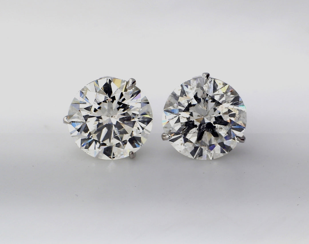 Stud earrings with 3-prong set USA certified G-H/SI2-SI3 round diamonds.  D10.01ct.t.w.
