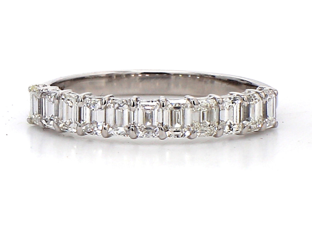 11-stone band with basket prong set emerald cut diamonds.  D1.03ct.t.w.  Size 6.25