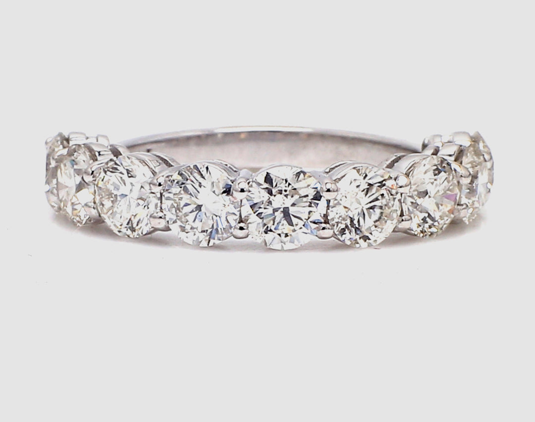 9-stone band in platinum with basket prong set round diamonds.  D2.18ct.t.w.  Size 5