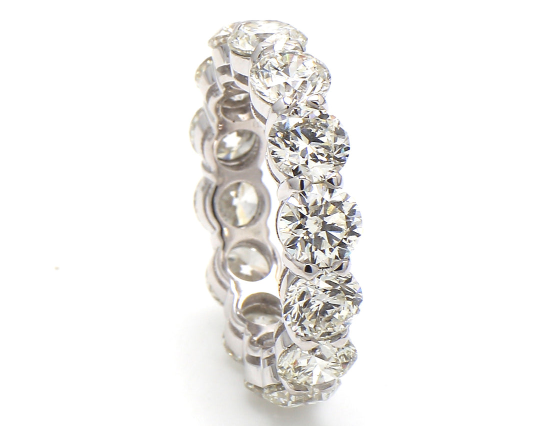 Eternity band in platinum with basket claw set H-I/VS1 (14) round diamonds.  D7.01ct.t.w.  Size 6