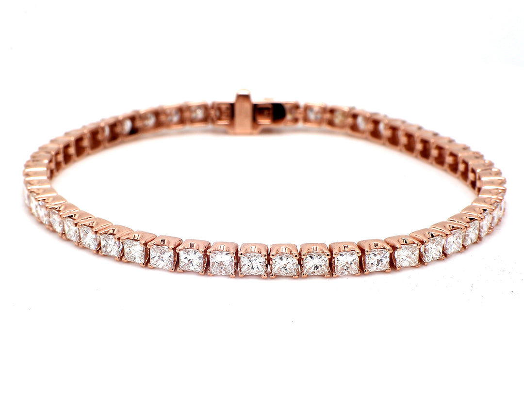 7"" Tennis bracelet in 14K RG with raised prong set (51) princess cut diamonds.  D7.06ct.t.w.