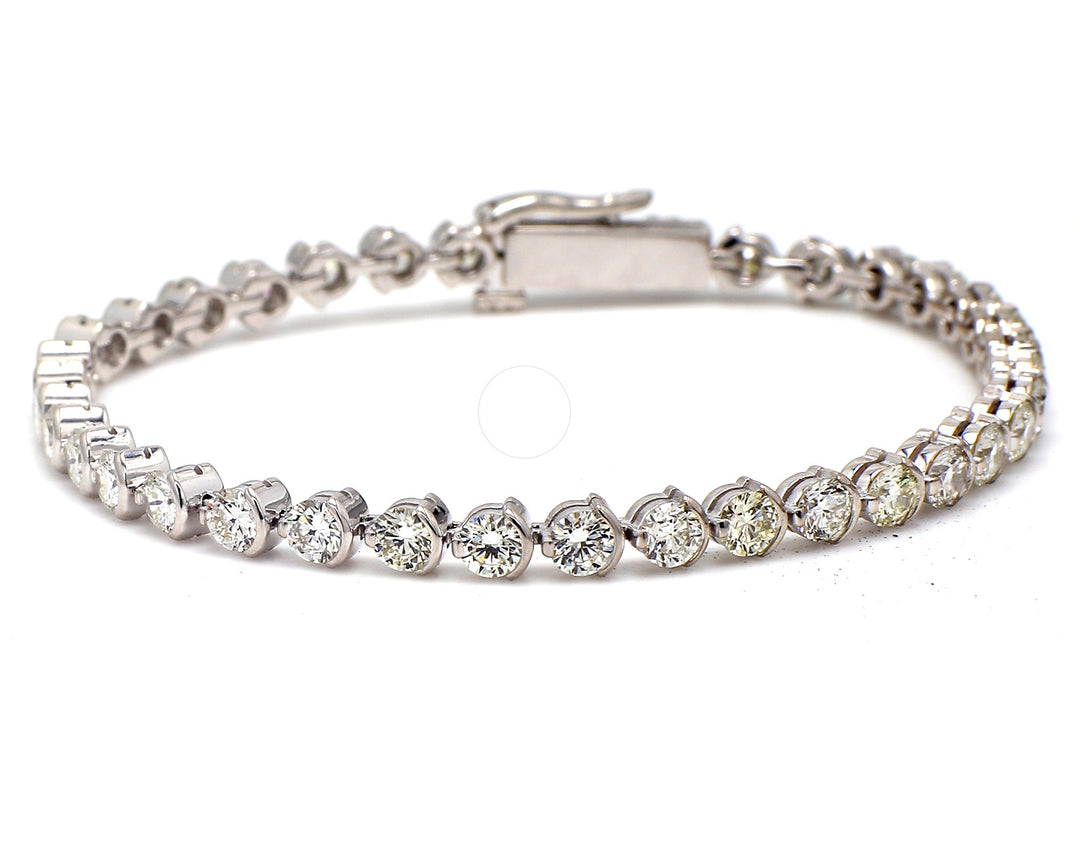 6.25"" Tennis bracelet with half bezel set (38) round diamonds.  D5.09ct.t.w.
