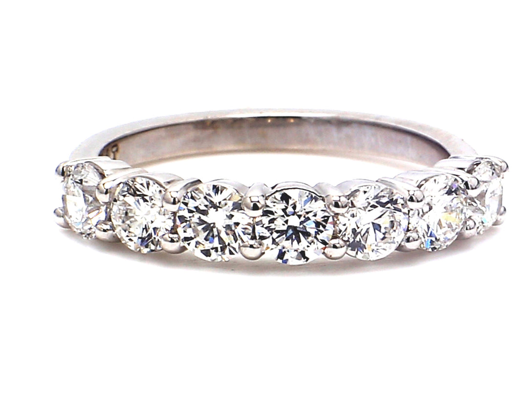 7-stone band in platinum with prong set round diamonds.  D1.22ct.t.w.  Size  6