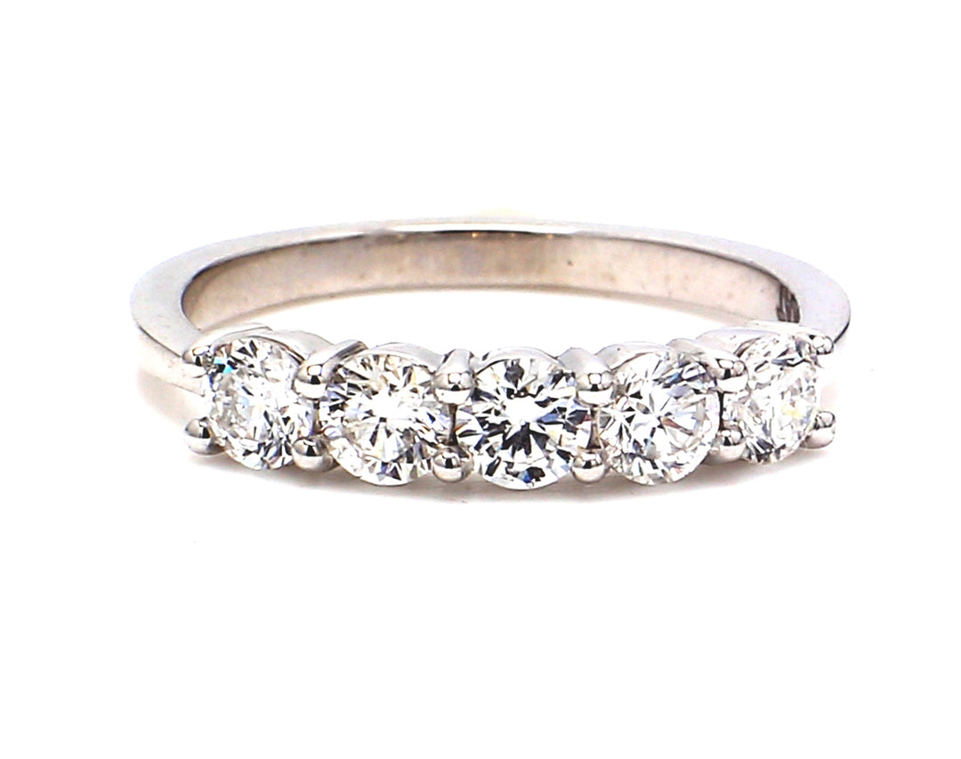 5-stone band in platinum with prong set round diamonds.  D0.73ct.t.w.  Size 5